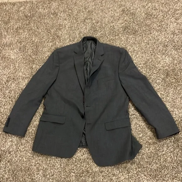 Grey suit. Collection by Michael Strahan. Size 42R, pants 36Wx32L